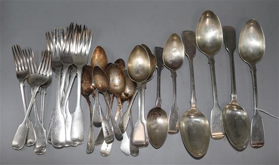 A quantity of mainly 19th century silver fiddle pattern flatware, various dates and makers, 40.5 oz.